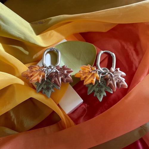 Handmade autumn leaf cluster polymer clay earrings on gold hoops
